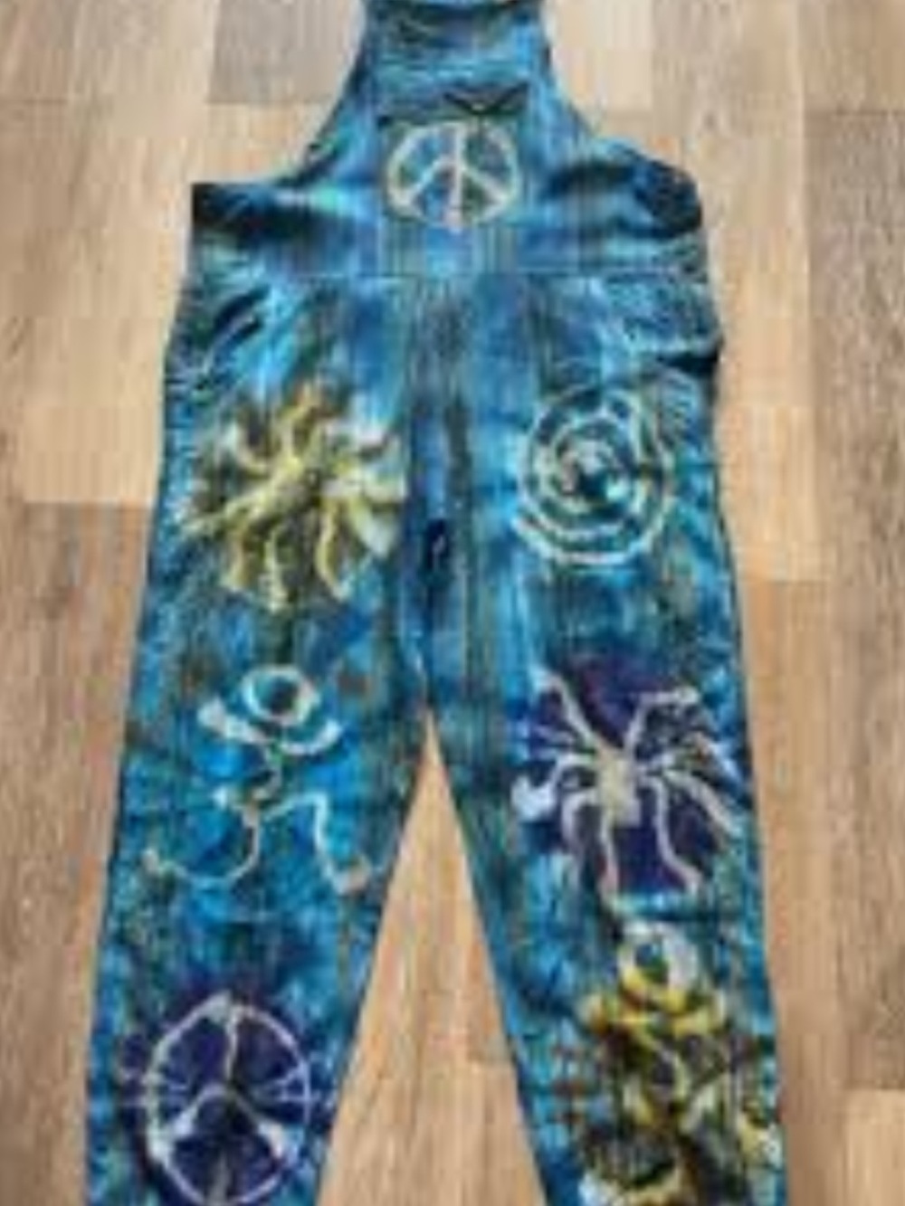 Rising International Blue Tie-Dye Women’s Jumpsuit with Peace & Sun Motifs